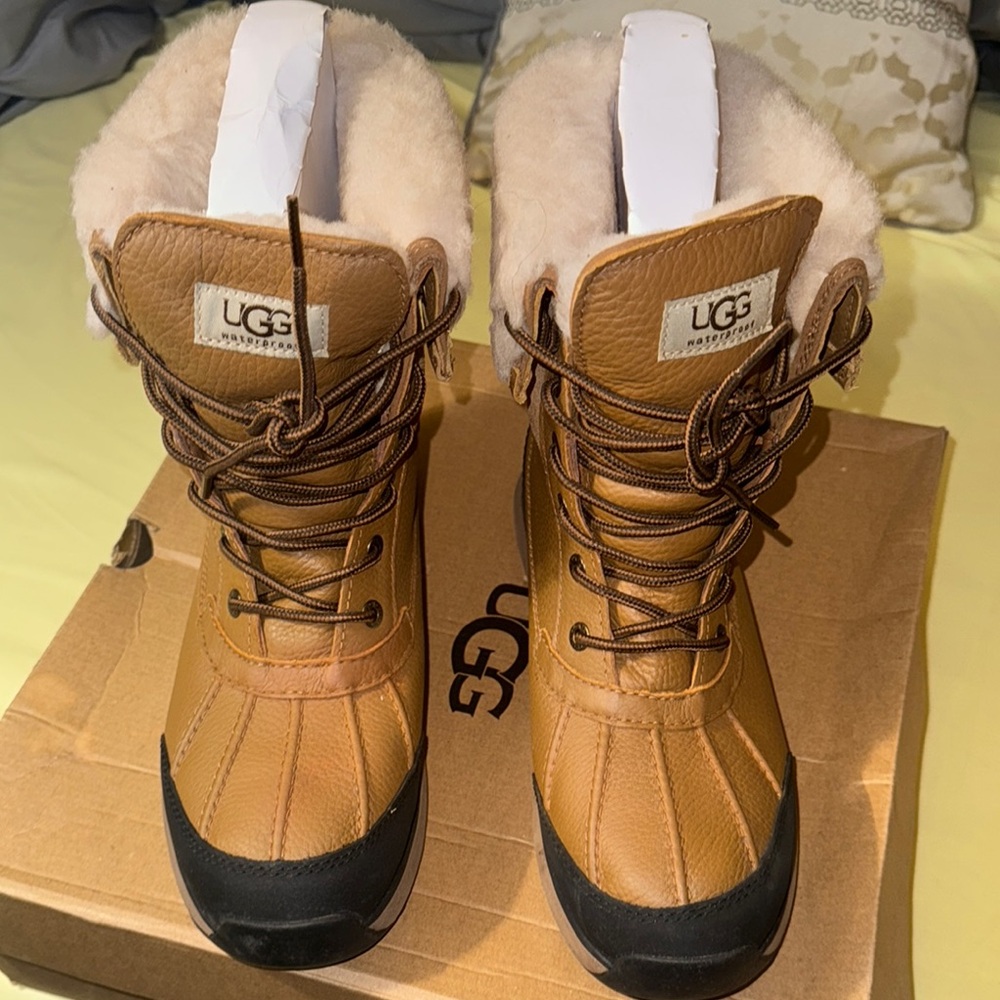 UGG Tan and Black Fur-Lined Boots